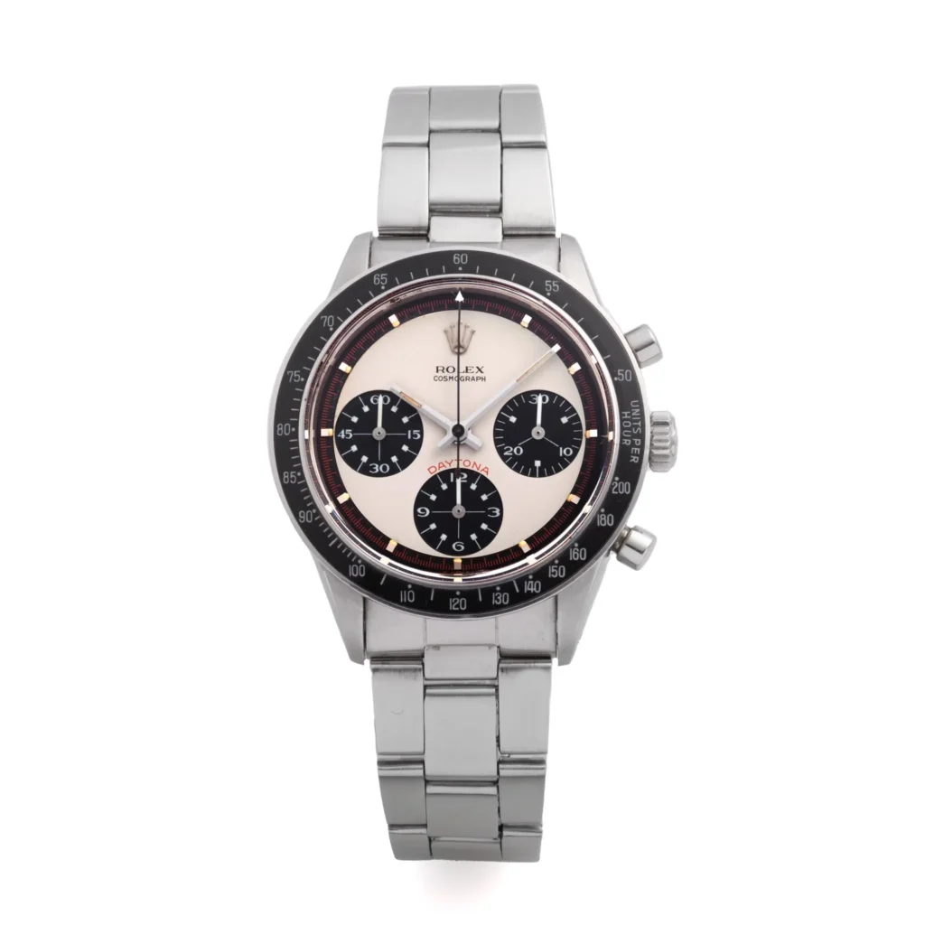 A silver Rolex Cosmograph Daytona chronograph wristwatch featuring a white face and three black subdials.