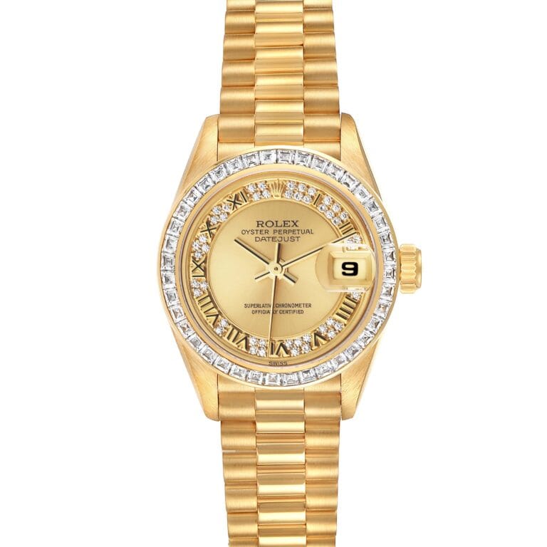 Gold Rolex Datejust watch with diamond bezel, gold Roman numerals, and a date display at 3 o’clock. This elegant Rolex 69128 timepiece blends classic design with timeless luxury.
