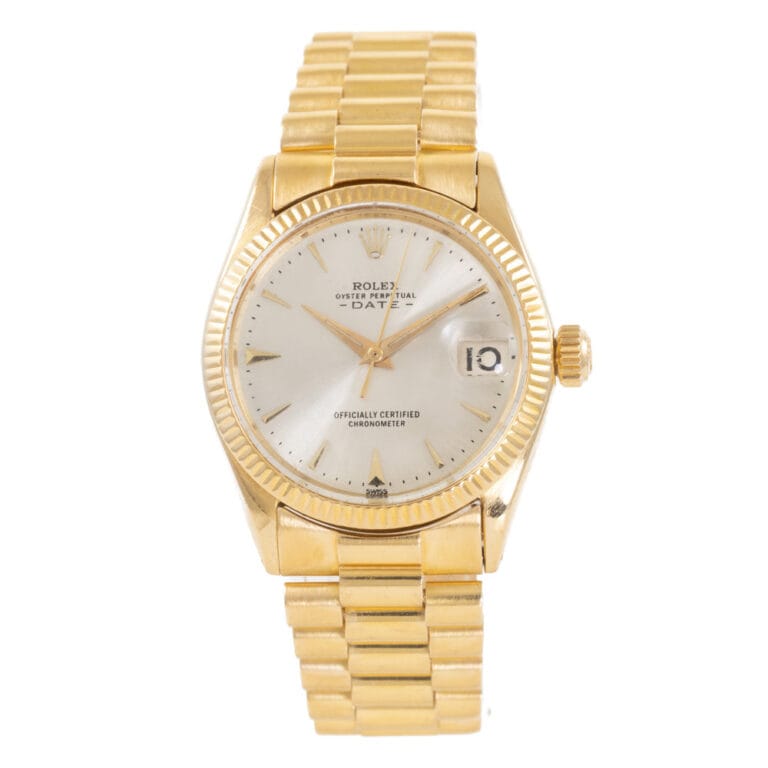 Gold Rolex Datejust 6627 wristwatch with a white dial, date display, and gold link band, shown from the front.