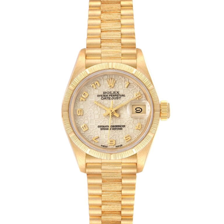 Gold Rolex Datejust 69278 watch with a patterned dial, gold hour markers, and a date window at the 3 oclock position.