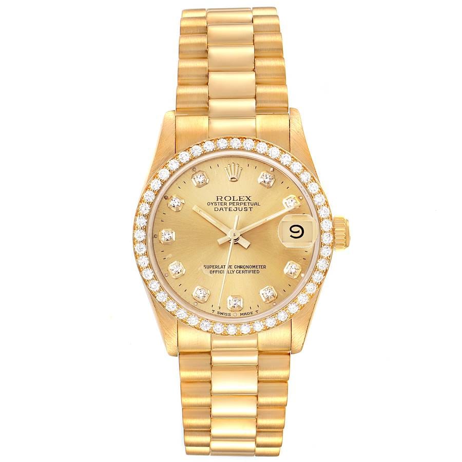 Gold Rolex Datejust 68288 watch with diamond hour markers and a date display, featuring a gold bracelet and bezel.