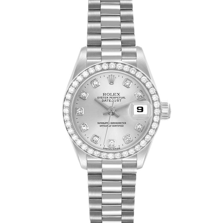 This silver Rolex Datejust 69136 watch features diamond hour markers and a date window at 3 o’clock, all set on a sleek metal bracelet.