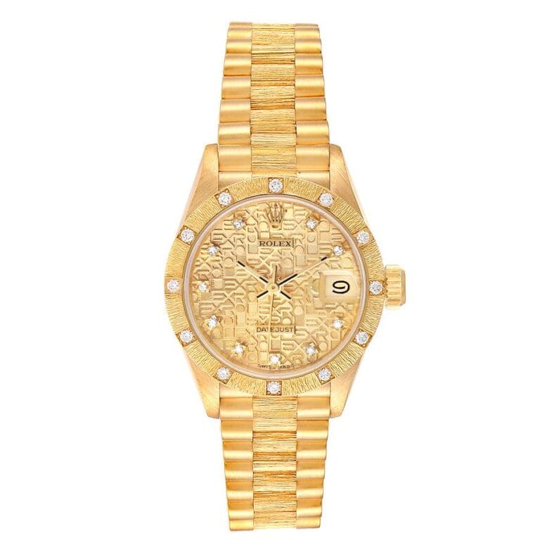 Gold Rolex Datejust 69288 wristwatch featuring diamond accents, a patterned dial, and a date display at the 3 o’clock position.