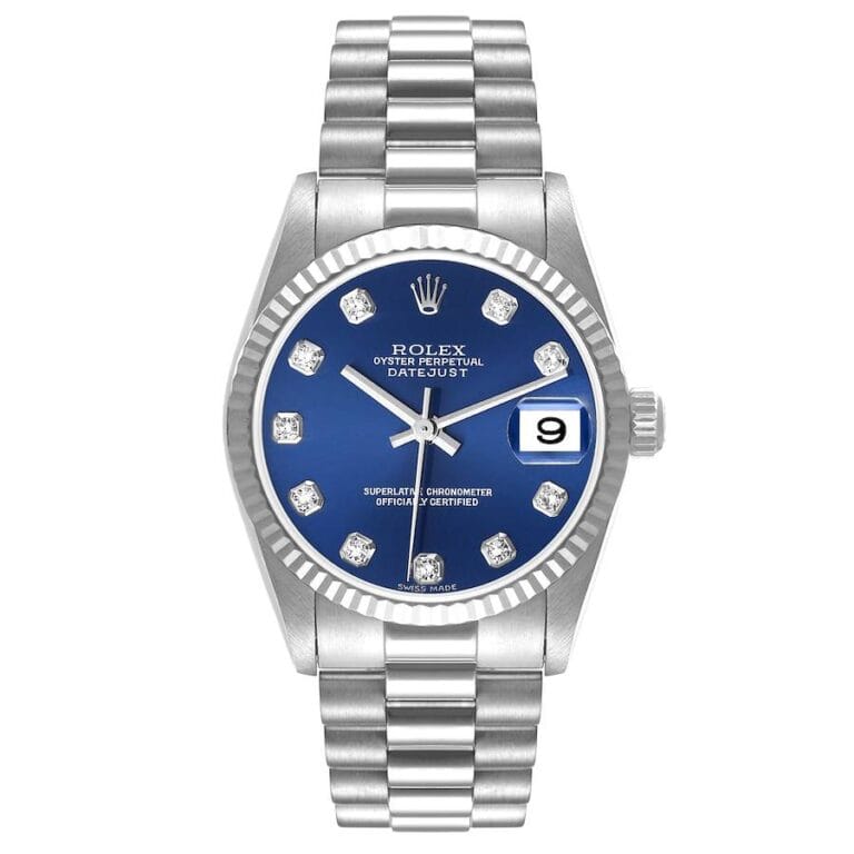 Silver Rolex Datejust 78279 watch featuring a blue dial, diamond hour markers, and a date window displaying the number 9.