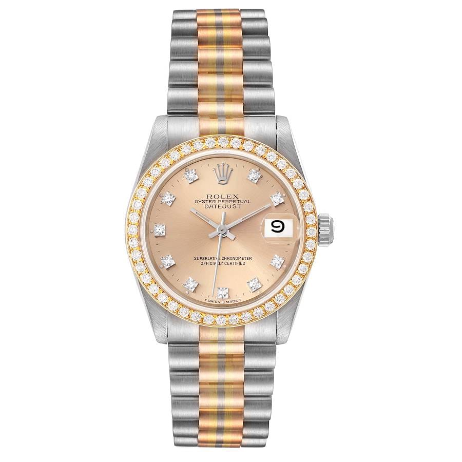 A Rolex Datejust 68289 watch with a gold and silver band, diamond bezel, and a champagne dial displaying the date.