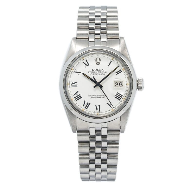 Silver Rolex Datejust 16000 watch with a white face, Roman numerals, and a date window, on a metal link bracelet.