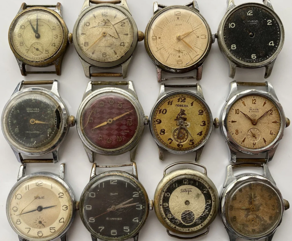 Twelve vintage wristwatches with worn faces and metal cases, perfect for collectors, arranged in a 3x4 grid on a white background—ideal for your next ebay find.