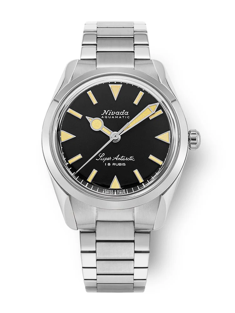 A silver Nivada Grenchen Aquamatic wristwatch with a black dial and yellow hour markers on a metal bracelet, reminiscent of the classic Super Antarctic 35013M20 design.