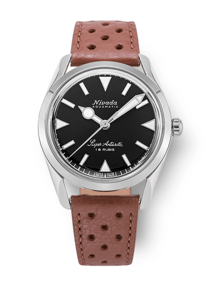 A Nivada Grenchen Super Antarctic wristwatch, model 35014M41, featuring a black dial, silver markers, and a brown perforated leather strap.