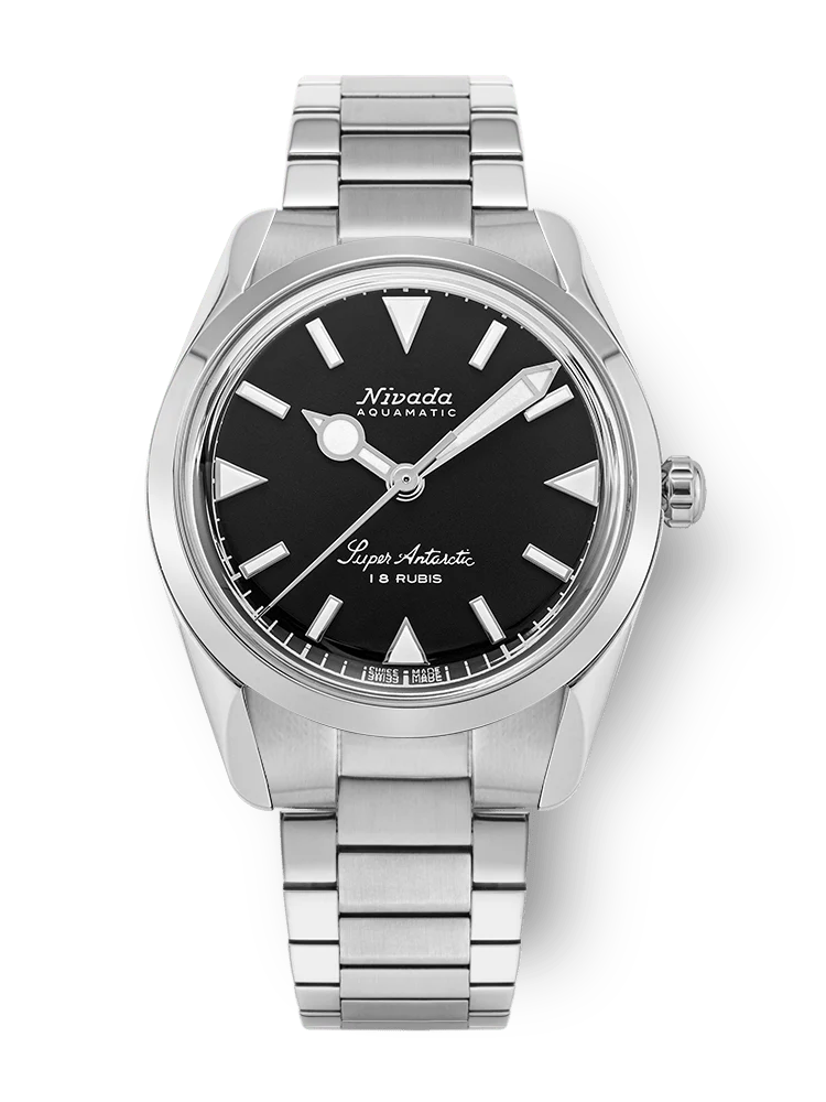 A Nivada Grenchen Super Antarctic silver wristwatch with a black dial and silver hour markers on a metal link bracelet, model 35014M20.