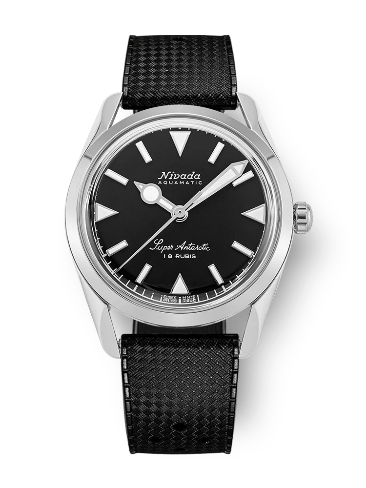 A black Nivada Grenchen Super Antarctic watch, model 35014M01, featuring a silver bezel, black dial, and a black textured leather strap.