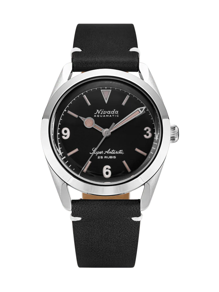 Black Nivada Grenchen Super Antarctic wristwatch with a silver case, black dial, and black leather strap, model 32032A15, showing 10:09.