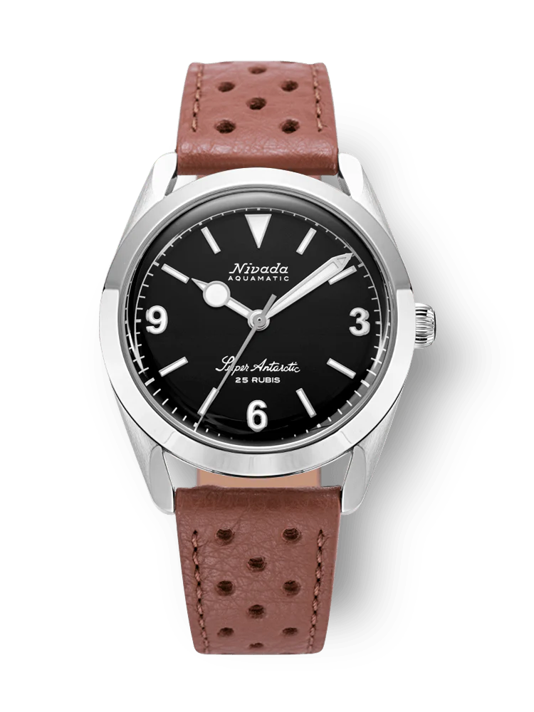 A Nivada Grenchen Super Antarctic wristwatch featuring a black dial, silver case, and brown perforated leather strap. Model 32039A23.