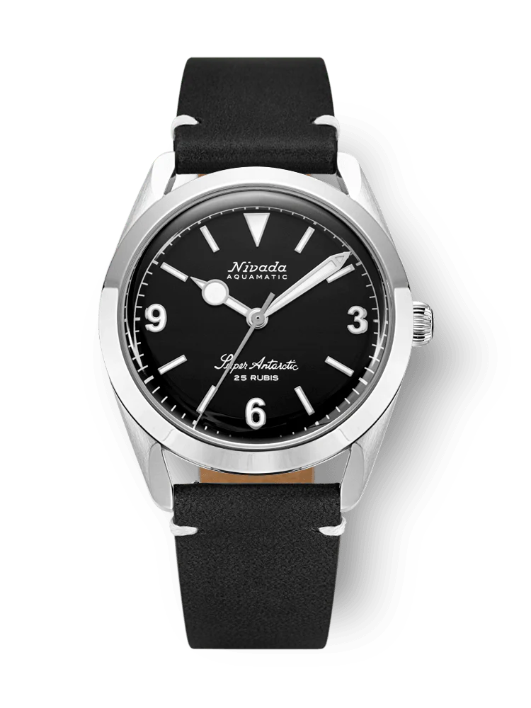 A black and silver Nivada Grenchen Super Antarctic wristwatch with a black leather strap and white hour markers, model 32039A15.