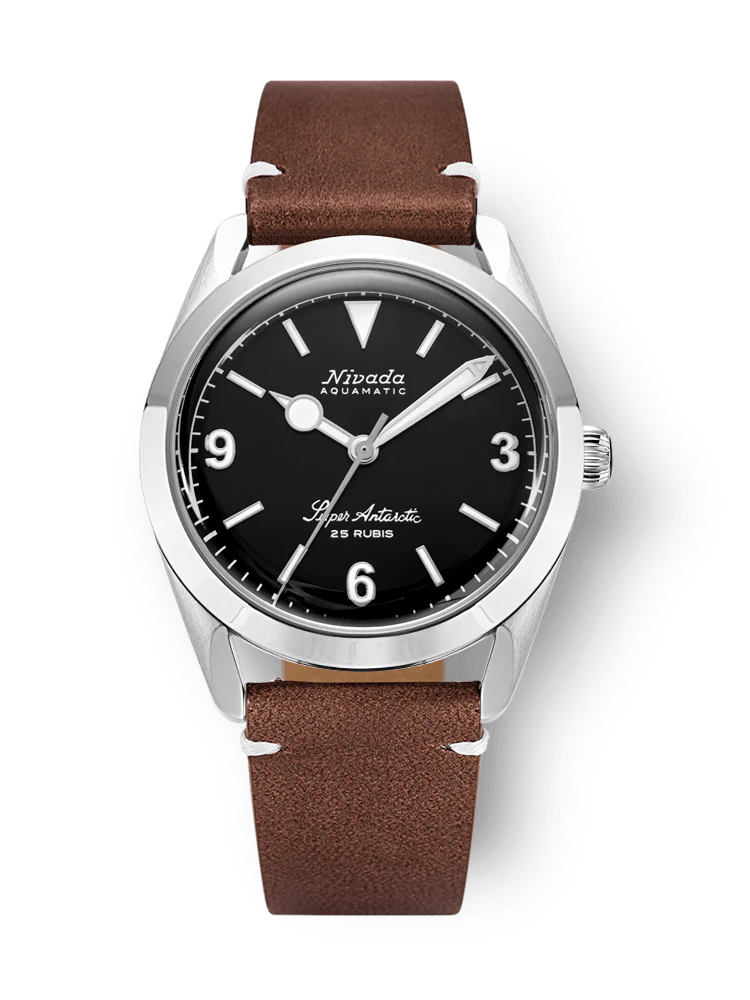 A Nivada Grenchen Super Antarctic automatic wristwatch featuring a black dial, silver bezel, and brown leather strap. Model 32039A14.
