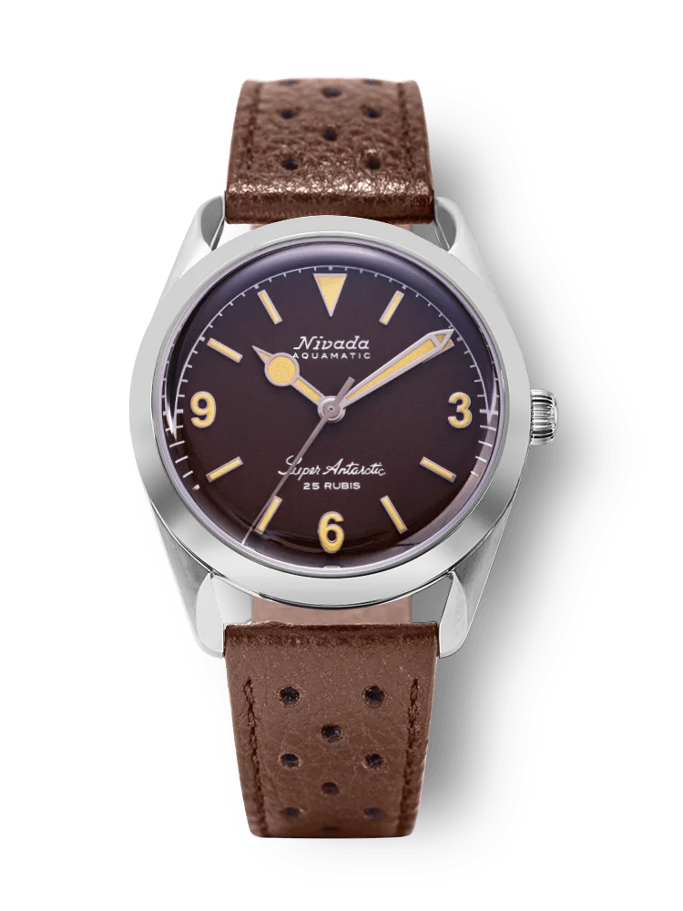 Vintage Nivada Grenchen Aquamatic watch with a brown dial and perforated brown leather strap, reminiscent of the classic Super Antarctic style.