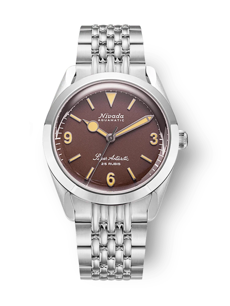 A Nivada Grenchen Super Antarctic silver wristwatch with a brown face, yellow markers, and a metal link band. Model: 32041A04.