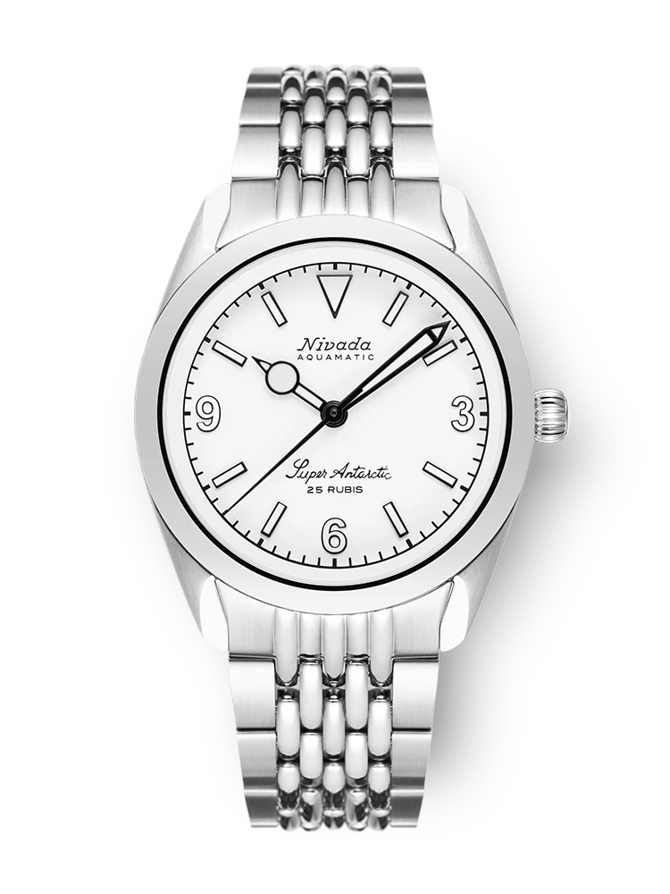 A silver Nivada Grenchen Super Antarctic wristwatch, model 32067A04, featuring a white dial and a sleek metal link bracelet.