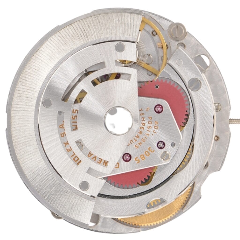 Close-up of a mechanical watch movement showing gears, cogs, and metal components.
