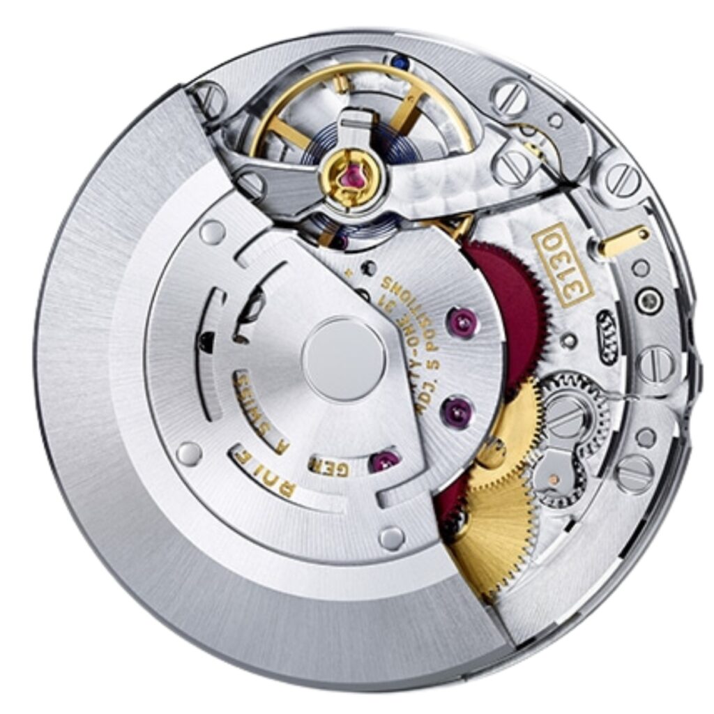 Silver and gold mechanical watch movement with gears and intricate parts visible.