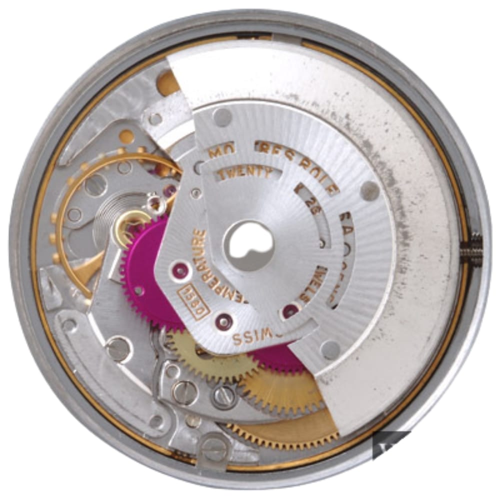 Close-up view of a mechanical watch movement with gears and metal components visible.