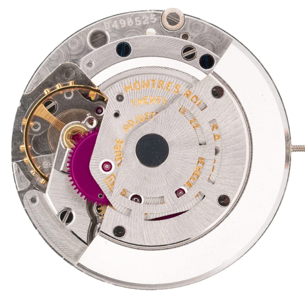 Close-up of a mechanical watch movement with visible gears and engraved text.