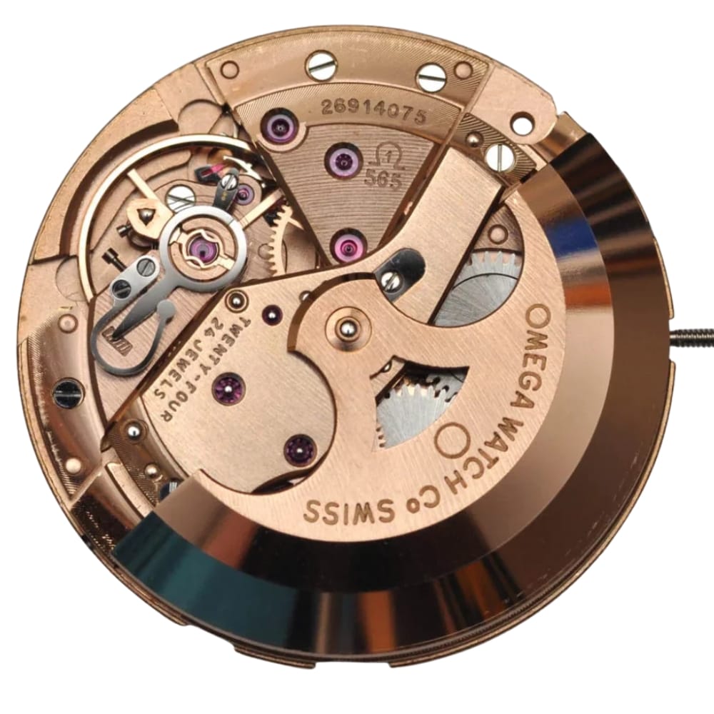 Close-up of a mechanical Omega watch movement with visible gears and engraved text.