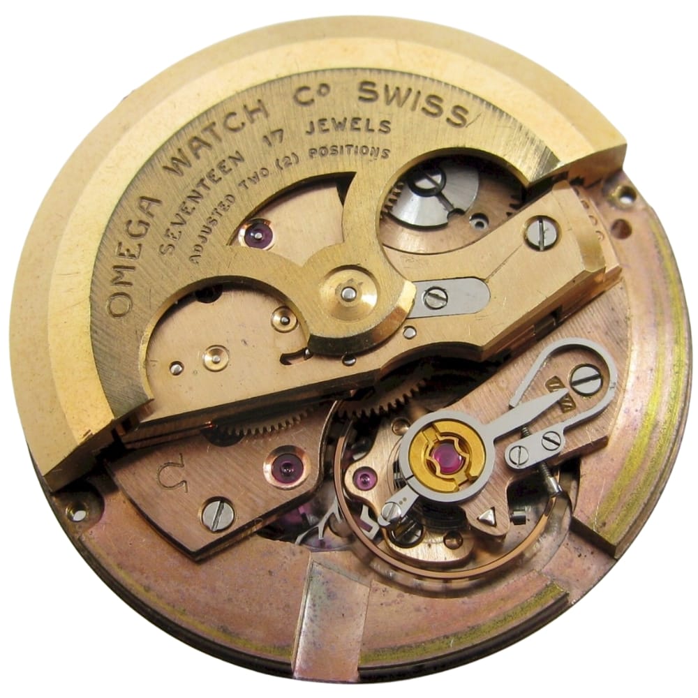 Close-up of an Omega Swiss watch movement showing gears, jewels, and intricate mechanical parts.