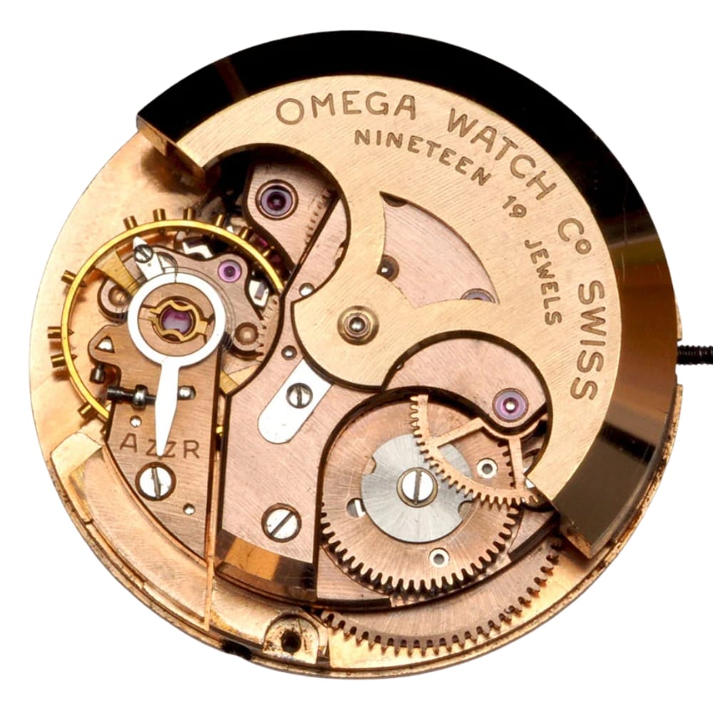 Close-up of a vintage Omega watch movement showing gears, inscriptions, and intricate mechanical parts.