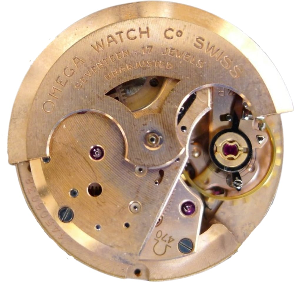 Close-up of an Omega watch movement, showing gears, jewels, and engraved text on the mechanism.