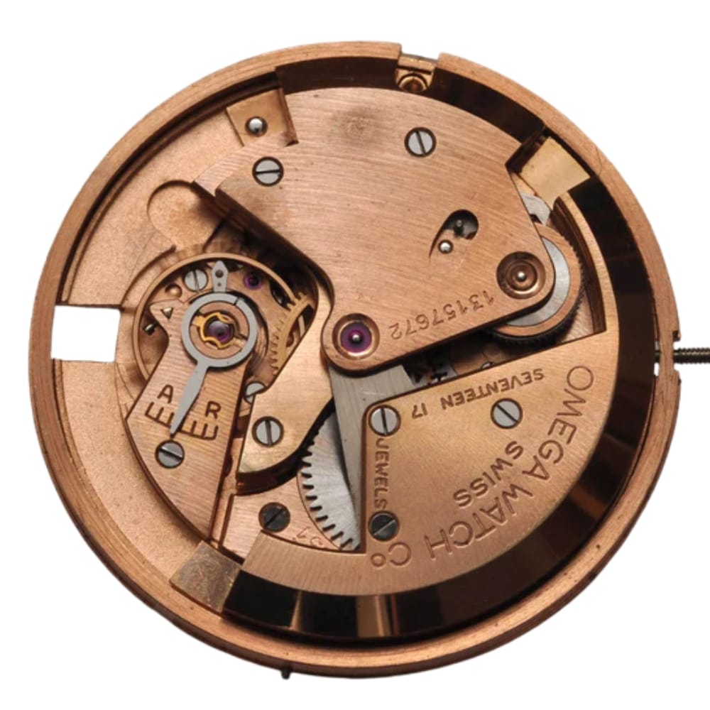 Close-up of a vintage Omega Swiss watch movement showing gears, jewels, and engraved markings.