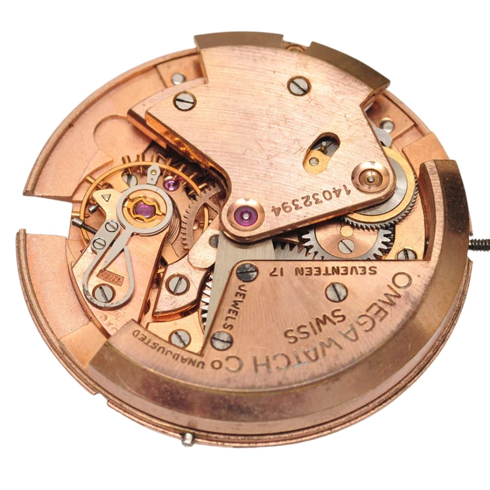 A close-up of a vintage Omega watch movement with visible gears and engraved markings.