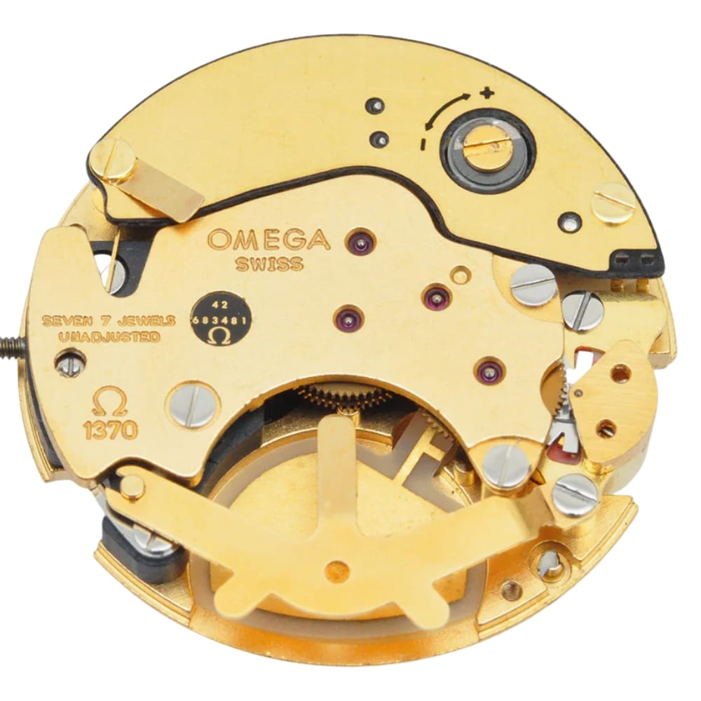 Close-up of a gold Omega Swiss watch movement with gears and intricate mechanical details visible.