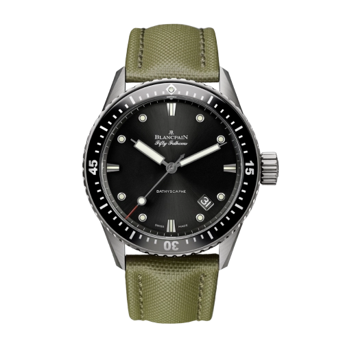 A luxury Blancpain Fifty Fathoms dive watch, model 5000-1230-K52A, featuring a black dial and an olive green fabric strap.