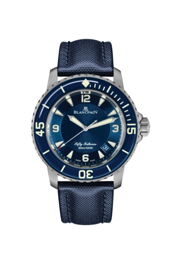 A blue Blancpain Fifty Fathoms 5015-12B40-O52A luxury watch featuring a fabric strap and large white numerals on the bezel.