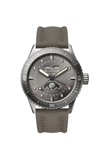 A gray Blancpain Fifty Fathoms 5054-1210-G52A luxury watch with day, date, and moon phase displays, featuring a fabric strap.