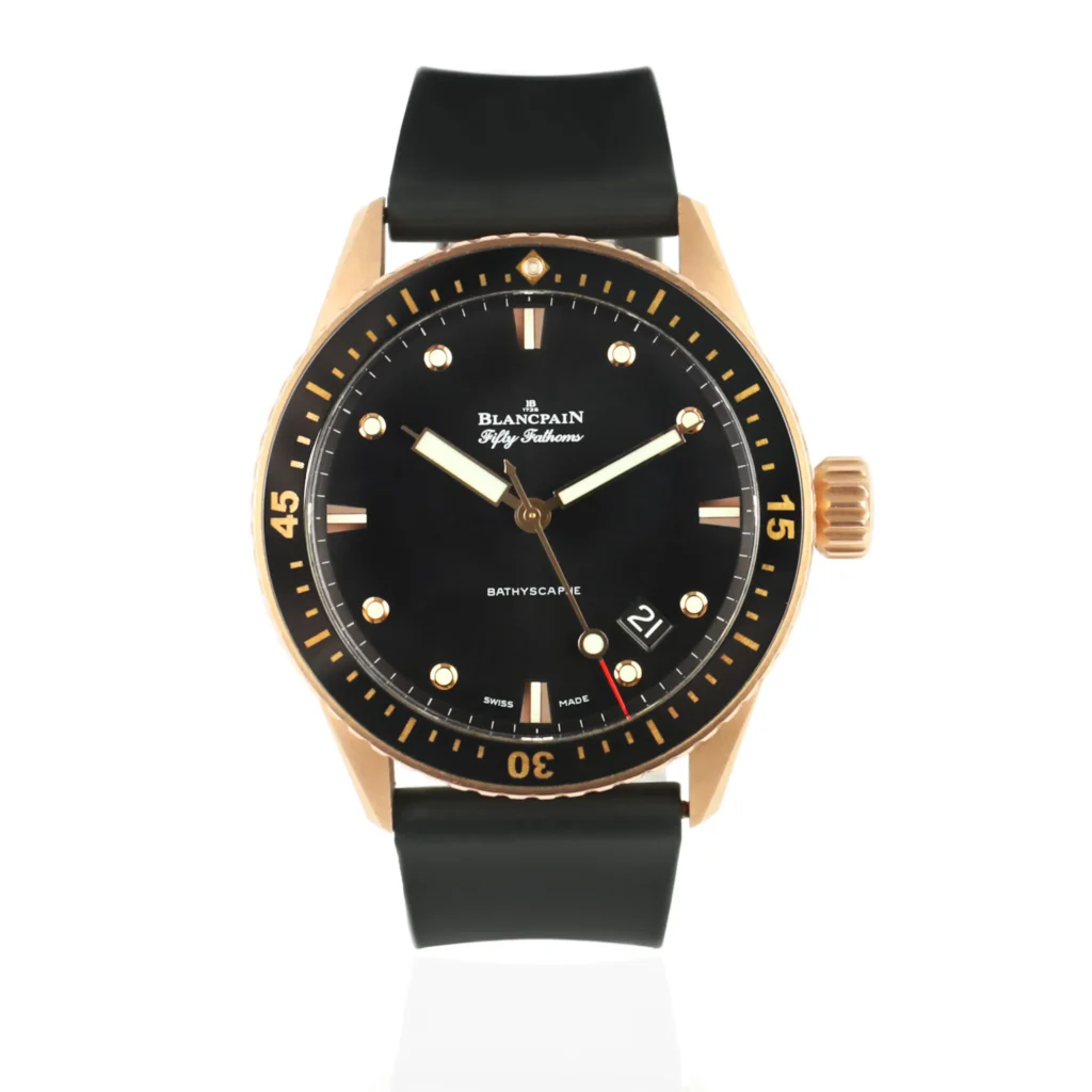 A luxury Blancpain Fifty Fathoms Bathyscaphe wristwatch with a black dial, gold case, and black strap, displayed on a white background.