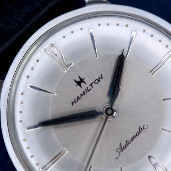 Close-up of a Hamilton Accumatic X Sunburst Dial Stainless Steel Cal. 667 wristwatch, displaying the time at 1:06.