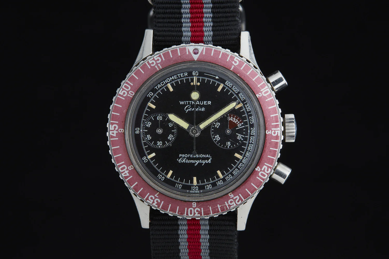 The Collector's Guide to Vintage Wittnauer Chronographs 7 A vintage wittnauer reference 7004A with a red diver's bezel.