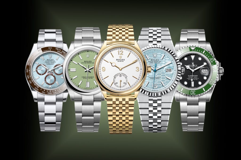 Five luxury Rolex wristwatches, each with distinct colored faces and bands, are displayed side by side on a dark background—perfect for collectors who appreciate unique styles and authentic Rolex serial numbers.