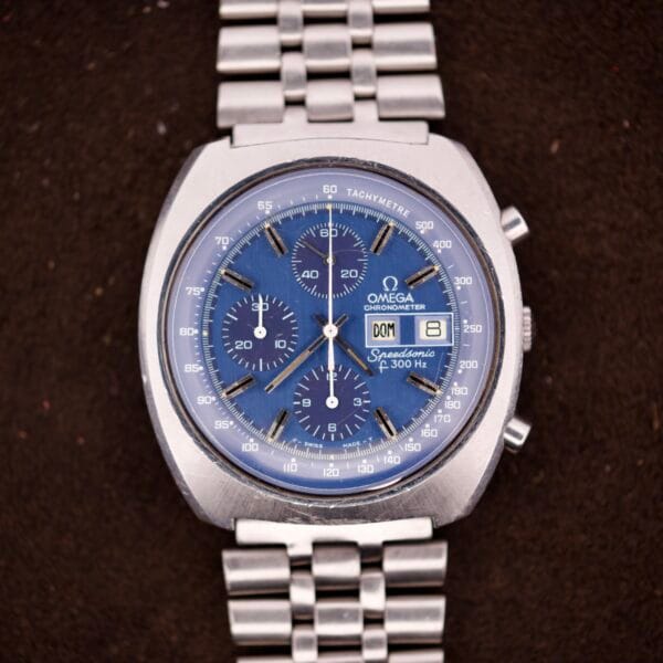 An Omega Seamaster Speedsonic F300 Ref. 188.0002 Chronograph with original bracelet and Spanish date is displayed on a dark background.