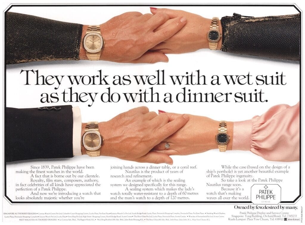 A man’s hand in a wetsuit and a woman’s hand in an evening dress, both adorned with Patek Philippe watches—his, the iconic Nautilus—touch wrists in an elegant meeting of worlds.