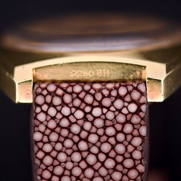 Close-up of a brown stingray leather strap attached to the gold Girard Perregaux Electronic Ref. 9280 6H Large Cushion Case.