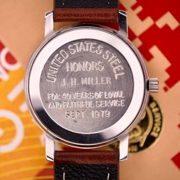 Close-up of an Omega Automatic Seamaster Ref. 166.020 for "U.S. Steel" Cal. 1010, awarded to J.H. Miller as a 40 years service award from U.S. Steel in 1979 (full set).