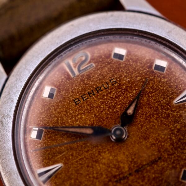 Close-up of the Benrus Shock-Absorber Tropic Dial Silver Indices wristwatch, featuring a brown dial with bold silver indices—showcasing its classic style and shock-absorber design.