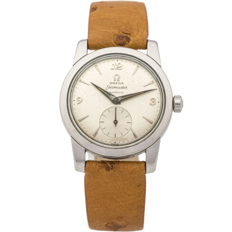 Vintage Omega Seamaster 2576 watch with a tan leather strap and silver dial displaying hours, minutes, and seconds.