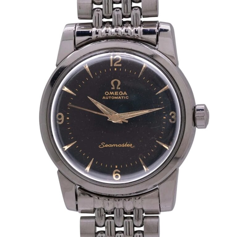 A vintage Omega Seamaster 2846 automatic watch with a black dial and stainless steel bracelet.