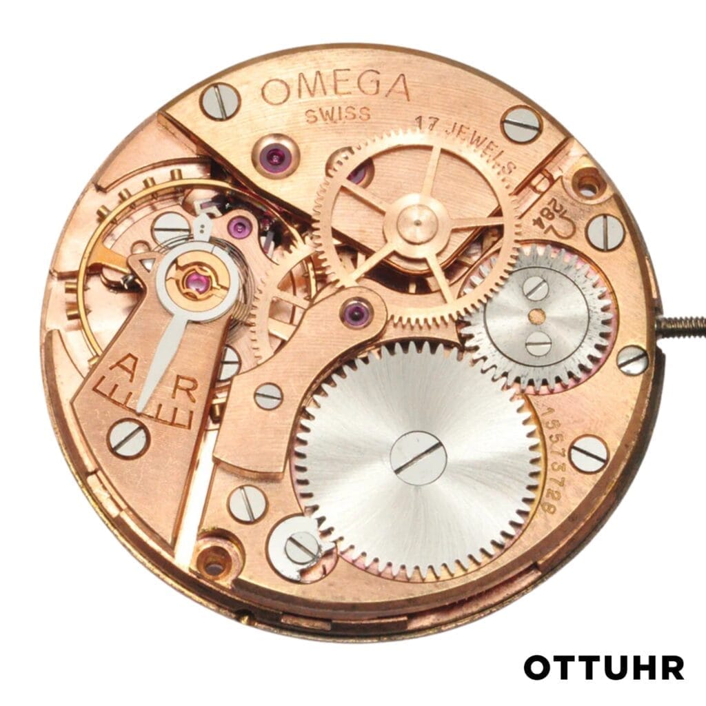 Close-up of a vintage Omega 284 watch movement, showcasing intricate gears and mechanical components.