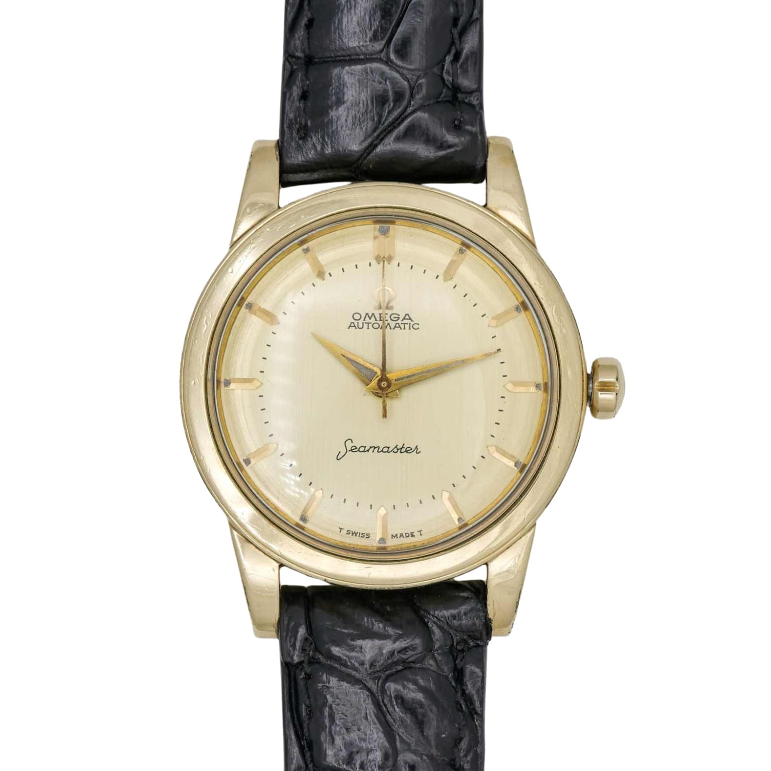 Gold Omega Seamaster 6250 wristwatch with a cream dial and black leather strap, showing the time at 12:05.