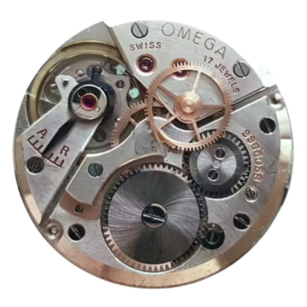 Close-up of an Omega watch movement showcasing intricate gears, cogs, and engraved Omega text on the metal parts.